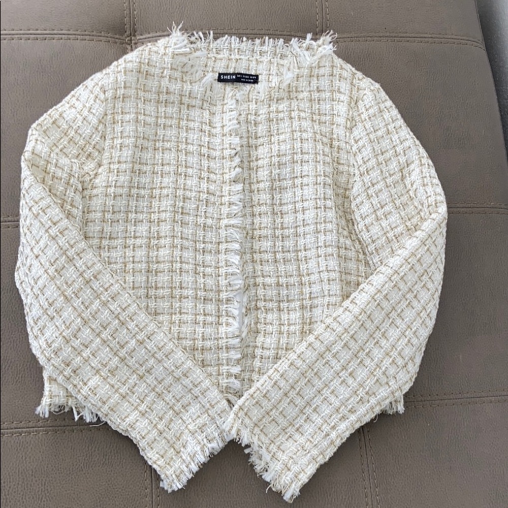 Never worn, making space in my closet.